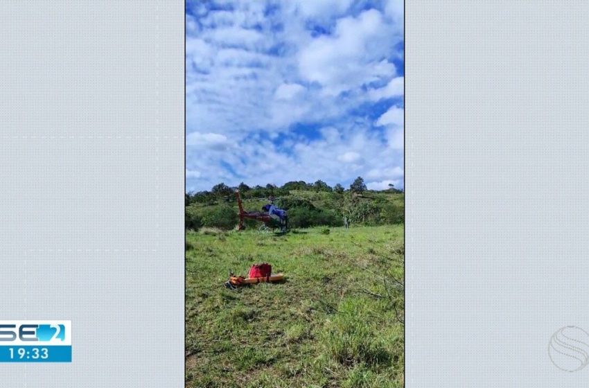  Jovem é resgatada de helicóptero após ficar isolada em cachoeira no interior de Sergipe